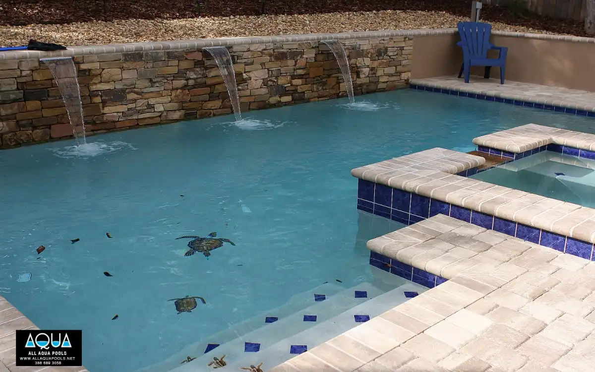Modern-pool-with-turtle-mosaics-and-blue-tile.jpg