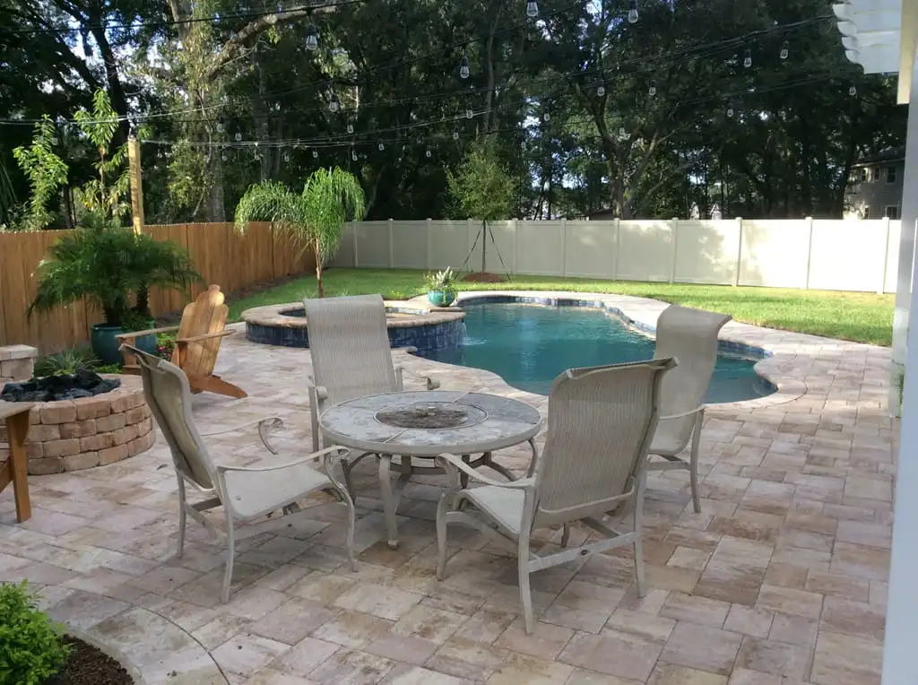 eating_area_firepit_and_pool_paver_deck.jpg