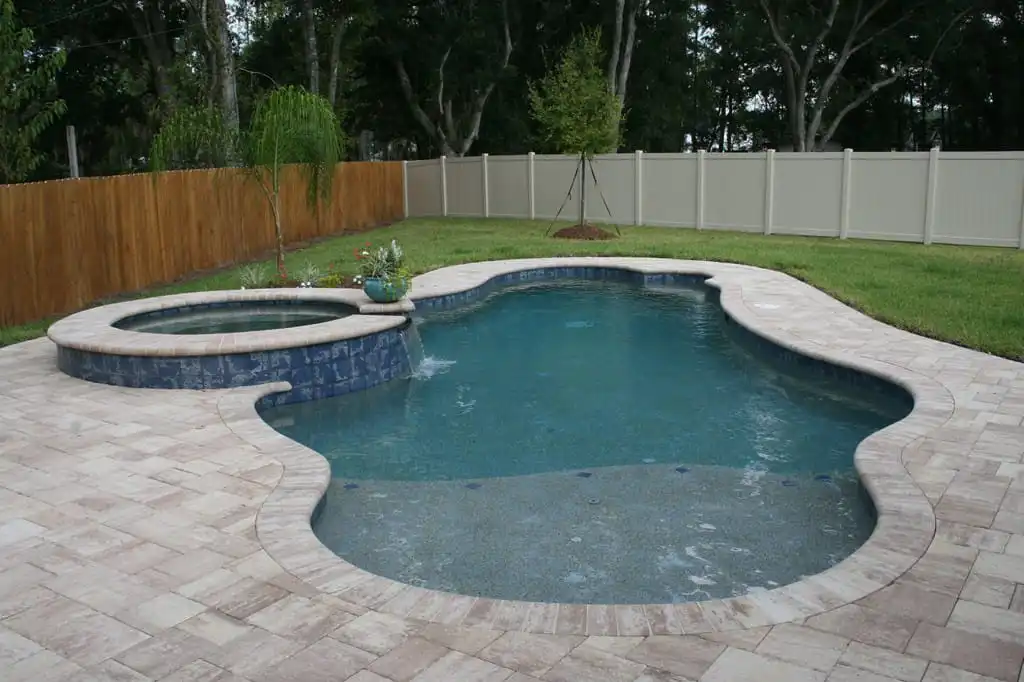 free_form_pool_with_spa_and_sunshelf.jpg