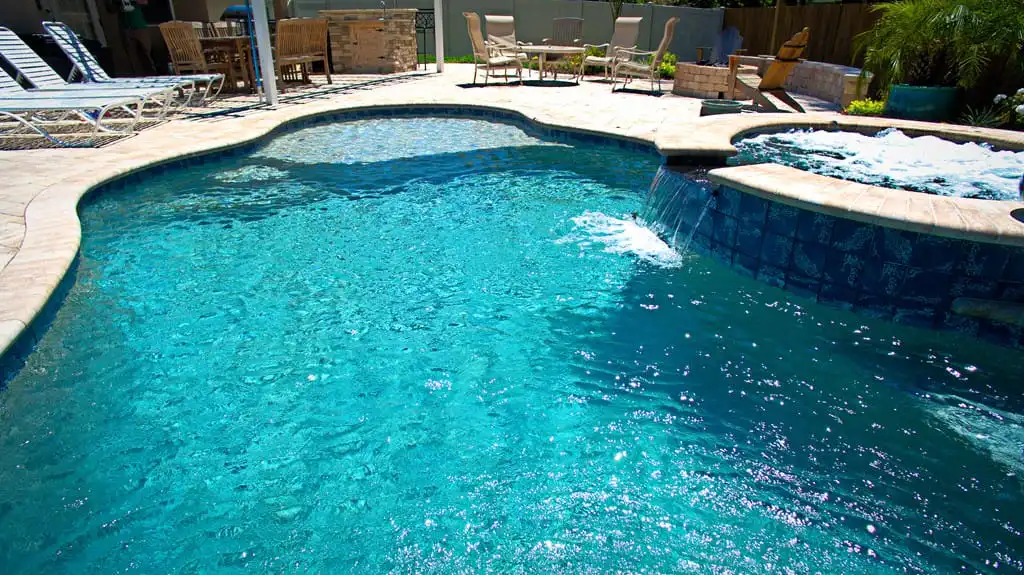 pool_with_attached_spa_spillover_and_sun_shelf_port_orange_florida.jpg