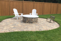 Custom fire pit next to free form pool