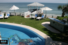 Oceanfront pool with bar and gazebo