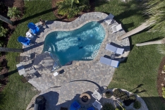 Free form pool with paver deck - New Smyrna Beach