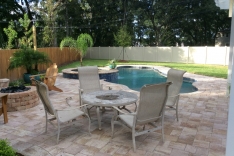 Eating area, fire pit, and pool paver deck