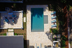 Pool with large backyard veranda