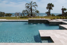 Oceanfront pool with spa and bench seats