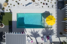 Modern pool with custom pergola - New Smyrna Beach, Florida