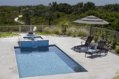 This modern pool is a short walk to the beach