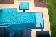 Overhead view of modern pool with two sun shelves