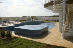 Modern pool with vanishing edge spa